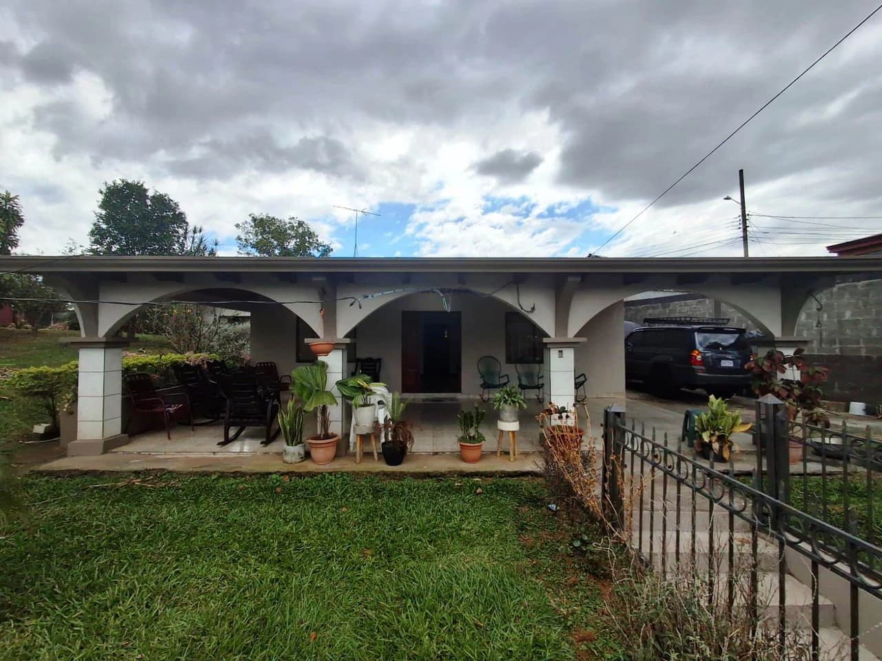 Casa Convenience: Grecia Garden Home on Large Lot + Rental Apartment! - photo 1
