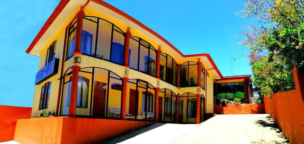 Monteverde Hotel & Attached 3-Bedroom House with Scenic Views CP0626: Boutique Hotel with Attached Private Residence in Monteverde – Turnkey Investment