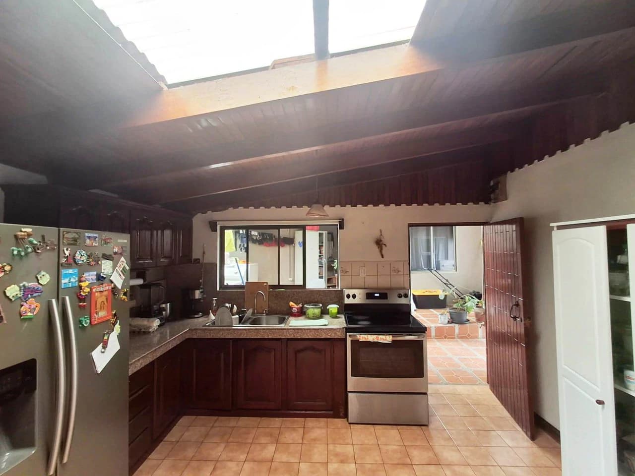Casa Convenience: Grecia Garden Home on Large Lot + Rental Apartment! - photo 9