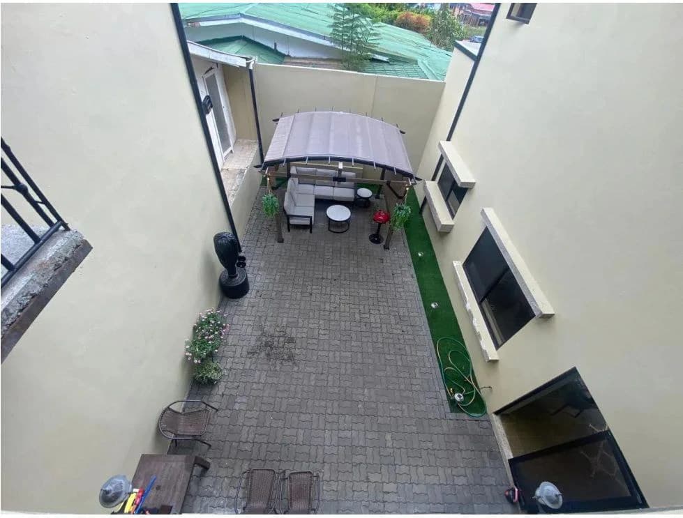 Elegant Family Home with Large Patio and Green Views in San Ramón de La Unión - photo 13