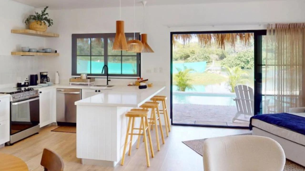 Exclusive Lakefront Residence with Pacific Panoramas: Boutique 3BR Living in Playa Hermosa - photo 2