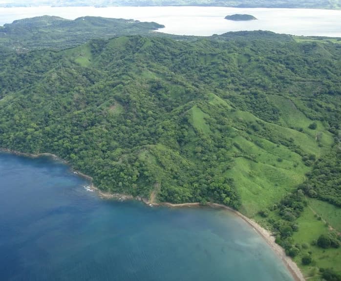 Copal Heights: Mountain, Near the Coast, Oceanfront and Riverfront Development Parcel For Sale in Playa Copal - photo 2