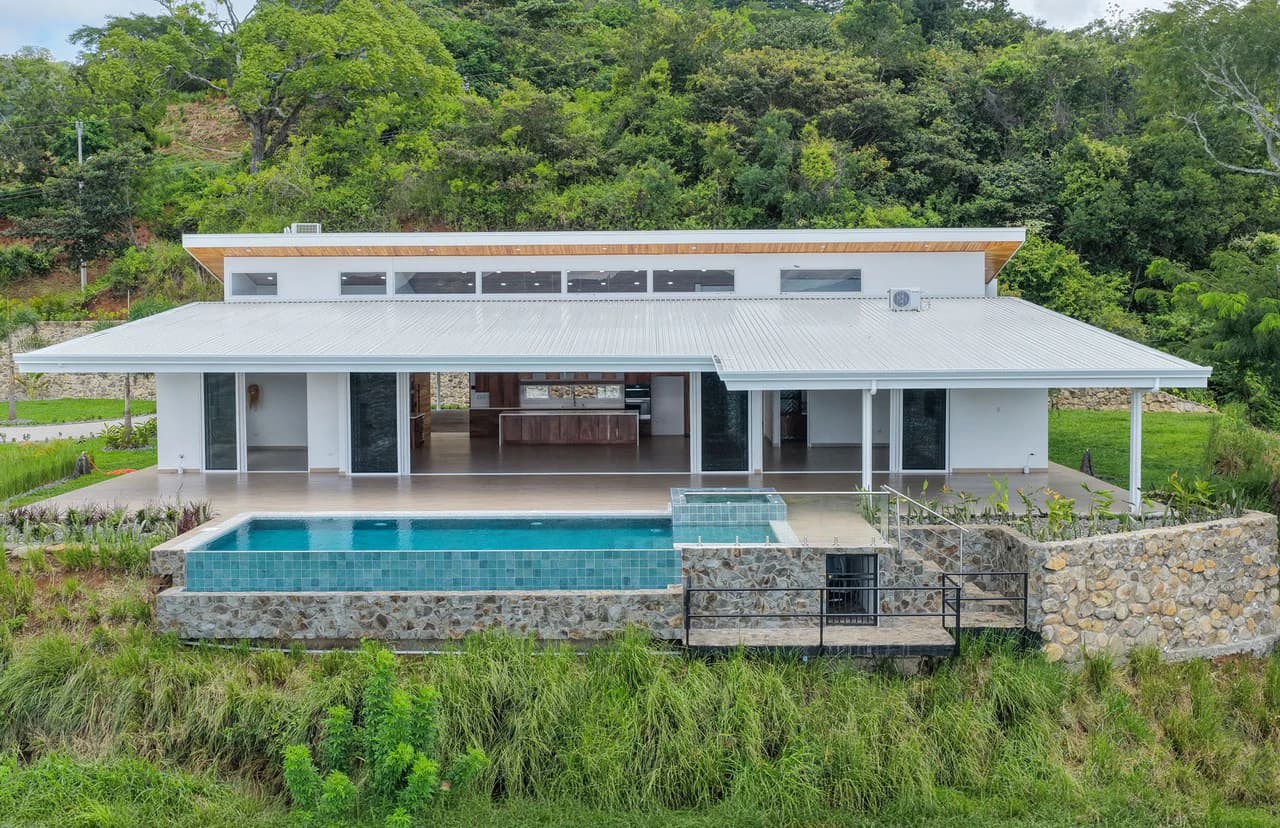 Brand-New Home for Sale in Vista Guácimo, Atenas | Infinity Pool | 180° Views - photo 1