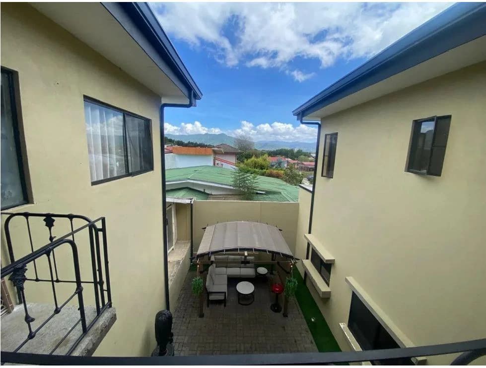 Elegant Family Home with Large Patio and Green Views in San Ramón de La Unión - photo 11