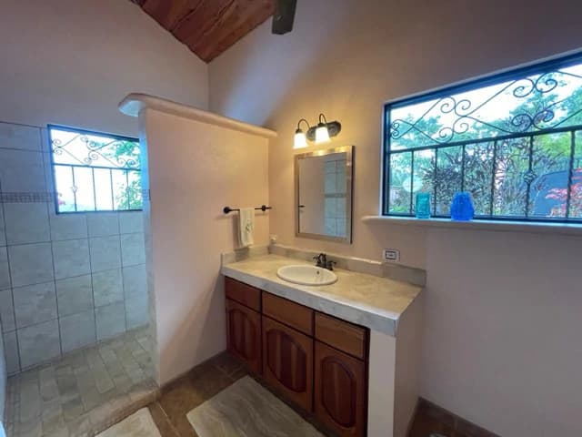 5.2 ACRES – 2 Bedroom Home With 60 Ft Infinity Lap Pool, 1 Bedroom Guest House, Fabulous Ocean View, Mature Fruit Trees!!! - photo 22