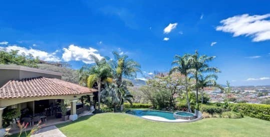 Paradise awaits you at Tropical Palace Villa Real Santa Ana luxury home for sale - photo 2
