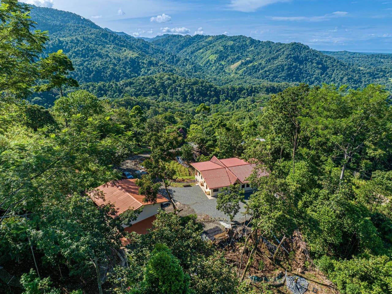 11.25 ACRES- 4 Bedrooms, Two Homes, Panoramic Ocean & Mountain Views With Stream, 30+ Fruit Trees, 40 Minutes to Quepos!!!