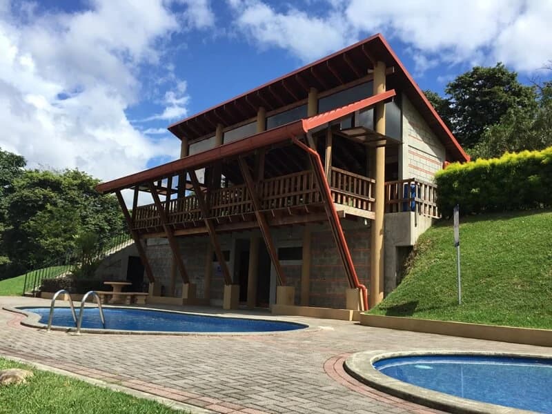 Casa 40 Grecia: Modern 4-BR Country Estate in Grecia | 4-Car Covered Garage, Solar Hot Water, First-Floor Bedroom & River Trails - photo 28