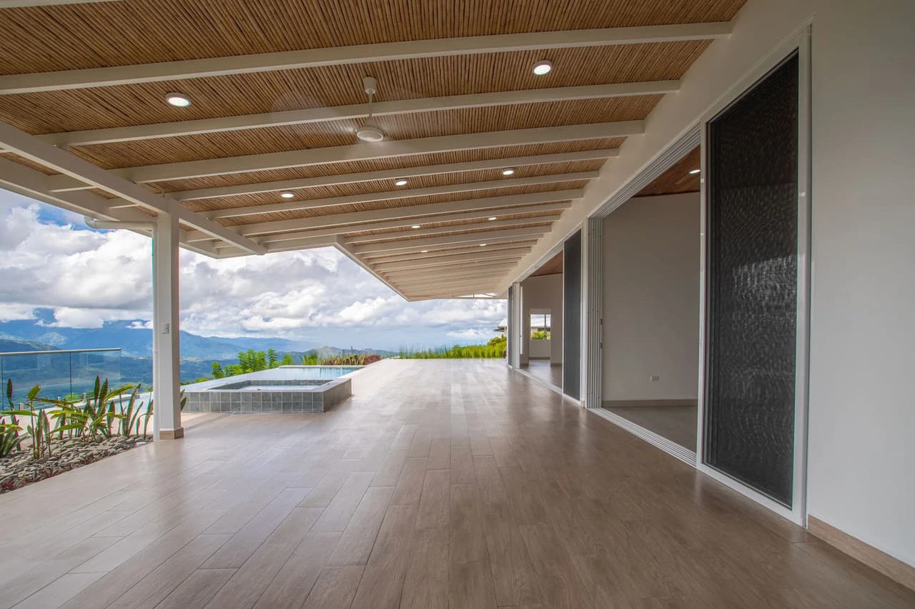 Brand-New Home for Sale in Vista Guácimo, Atenas | Infinity Pool | 180° Views - photo 18