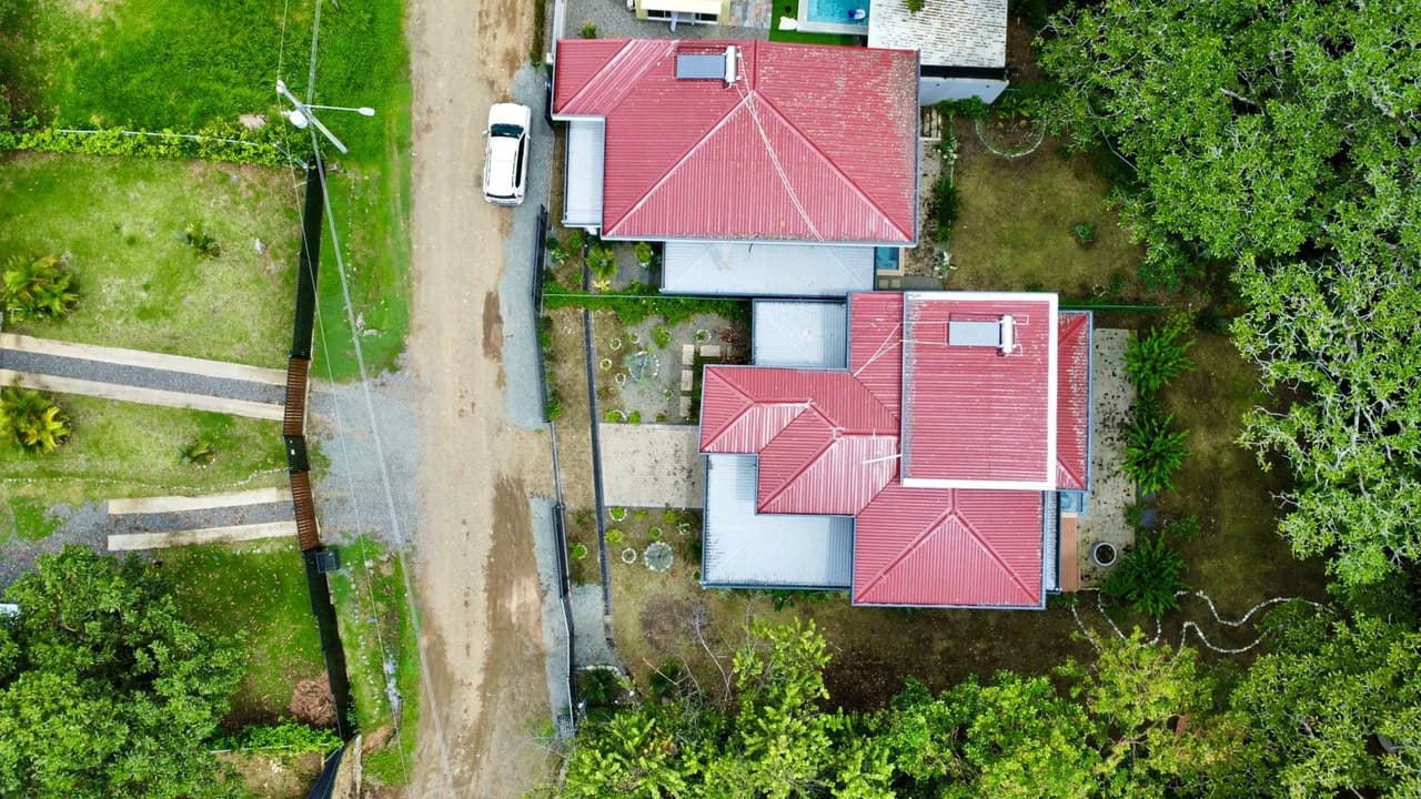 0.17 ACRES – 3 Bedrooms, Brand New Luxury Home in Uvita, Minutes From Beaches and Services, Wooded Lot, Year Round Stream, Private And Fully Furnished, Ready to Move!!! - photo 9