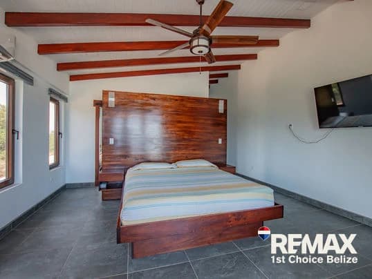 Own Your Slice of Paradise in This Beach Front Home - photo 17