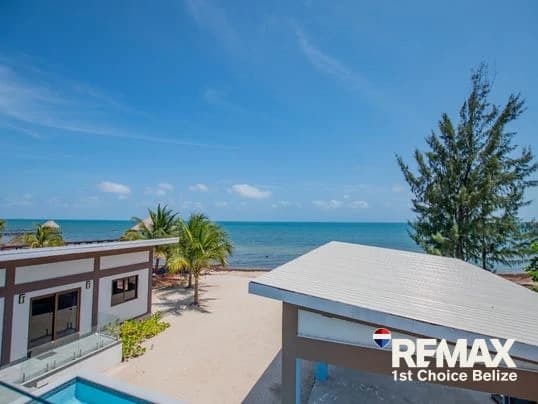 Own Your Slice of Paradise in This Beach Front Home - photo 2