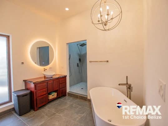Own Your Slice of Paradise in This Beach Front Home - photo 12