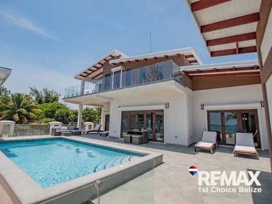 Own Your Slice of Paradise in This Beach Front Home - photo 1