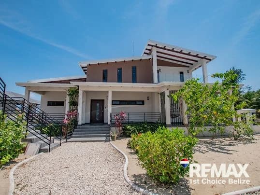Own Your Slice of Paradise in This Beach Front Home - photo 3