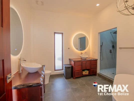 Own Your Slice of Paradise in This Beach Front Home - photo 11