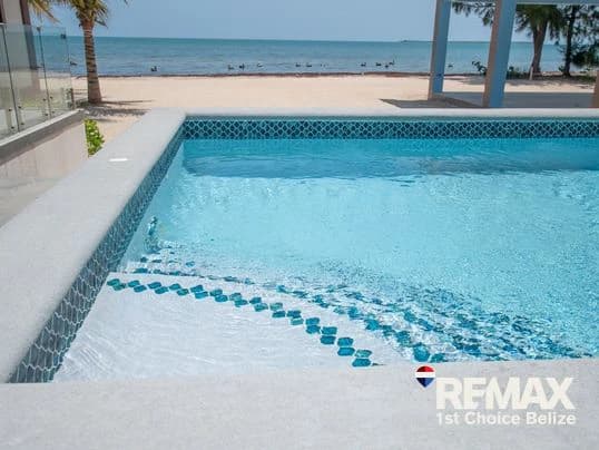 Own Your Slice of Paradise in This Beach Front Home - photo 4